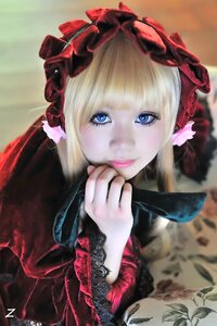 Rating: Safe Score: 0 Tags: 1girl bangs blonde_hair blue_eyes blurry depth_of_field dress eyelashes flower lips long_sleeves looking_at_viewer realistic rose shinku smile solo User: admin