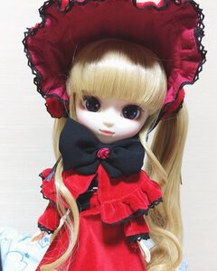 Rating: Safe Score: 0 Tags: 1girl bangs blonde_hair blue_eyes bonnet bow bowtie doll dress long_hair looking_at_viewer red_dress shinku simple_background solo twintails upper_body User: admin