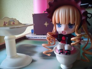 Rating: Safe Score: 0 Tags: 1girl blonde_hair blue_eyes bonnet chibi doll drill_hair figure flower long_hair photo red_flower rose shinku solo twin_drills twintails User: admin