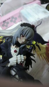 Rating: Safe Score: 0 Tags: 1girl black_dress black_wings blurry blurry_background blurry_foreground depth_of_field doll dress flower frills hairband long_hair long_sleeves motion_blur photo red_eyes rose silver_hair solo suigintou wings User: admin