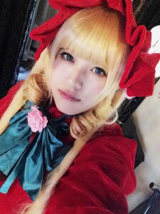 Rating: Safe Score: 0 Tags: 1girl bangs blonde_hair blue_eyes blunt_bangs bow dress drill_hair flower lips looking_at_viewer photo ribbon rose shinku smile solo traditional_media upper_body User: admin