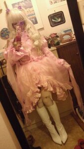 Rating: Safe Score: 0 Tags: 1girl barasuishou blonde_hair boots crown dress frills indoors mirror photo_(object) pink_dress solo User: admin