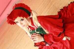 Rating: Safe Score: 0 Tags: 1girl blonde_hair blue_eyes bonnet bow capelet closed_mouth dress frills lips lolita_fashion long_hair long_sleeves looking_at_viewer realistic red_dress shinku solo User: admin