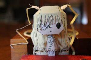 Rating: Safe Score: 0 Tags: 1girl auto_tagged blonde_hair blurry blurry_background blurry_foreground depth_of_field doll halo indoors kirakishou photo solo User: admin