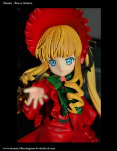 Rating: Safe Score: 0 Tags: 1girl bangs blonde_hair blue_eyes blurry bonnet bow bowtie doll dress drill_hair flower green_bow letterboxed long_hair long_sleeves looking_at_viewer red_dress rose shinku sidelocks solo subtitled twintails watermark web_address User: admin