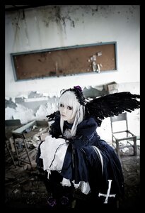 Rating: Safe Score: 0 Tags: 1girl black_border black_wings blurry depth_of_field dress feathers frills indoors letterboxed long_sleeves looking_at_viewer solo suigintou wings User: admin