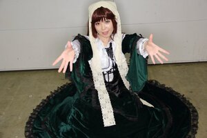 Rating: Safe Score: 0 Tags: 1girl black_dress brown_hair dress frills green_dress jewelry long_sleeves looking_at_viewer outstretched_arms outstretched_hand smile solo suiseiseki User: admin