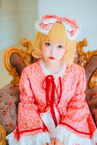 Rating: Safe Score: 0 Tags: 1girl blonde_hair blurry bow curly_hair depth_of_field dress frills green_eyes hair_bow hina_ichigo hinaichigo lips looking_at_viewer photo realistic ribbon short_hair sitting solo User: admin