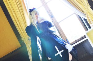 Rating: Safe Score: 0 Tags: 1girl blonde_hair blue_eyes curtains dress indoors long_hair ribbon solo standing suigintou window User: admin