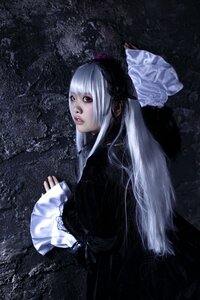 Rating: Safe Score: 0 Tags: 1girl bangs dress frilled_sleeves frills lips long_hair long_sleeves looking_at_viewer red_eyes silver_hair solo suigintou User: admin