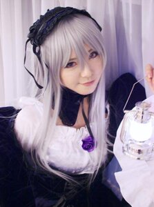 Rating: Safe Score: 0 Tags: 1girl dress flower gothic_lolita hairband lips lolita_fashion long_hair looking_at_viewer purple_eyes rose silver_hair solo suigintou User: admin