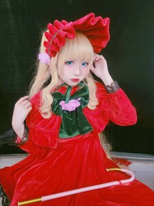 Rating: Safe Score: 0 Tags: 1girl bangs blonde_hair blue_eyes bow dress flower lips long_hair long_sleeves looking_at_viewer red_dress shinku solo User: admin