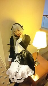 Rating: Safe Score: 0 Tags: 1girl black_dress black_ribbon dress indoors long_hair long_sleeves ribbon sitting solo standing suigintou User: admin