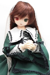 Rating: Safe Score: 0 Tags: 1girl brown_hair doll dress frills green_dress heterochromia long_hair long_sleeves looking_at_viewer red_eyes simple_background smile solo suiseiseki very_long_hair white_background User: admin