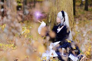 Rating: Safe Score: 0 Tags: 1girl blurry blurry_background blurry_foreground closed_eyes depth_of_field dress flower frills hairband long_hair long_sleeves motion_blur photo profile ribbon silver_hair solo suigintou User: admin