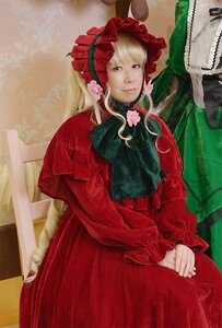 Rating: Safe Score: 0 Tags: 1girl blonde_hair blue_eyes bonnet bow capelet dress flower frills long_hair long_sleeves looking_at_viewer photo red_dress shinku solo User: admin