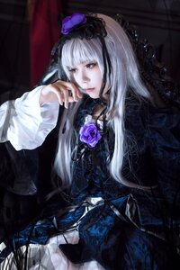 Rating: Safe Score: 0 Tags: 1girl bangs dress flower frills gothic_lolita lips lolita_fashion long_hair long_sleeves sitting solo suigintou white_hair User: admin