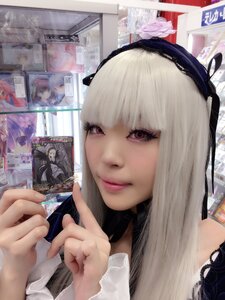 Rating: Safe Score: 0 Tags: 1girl 3d bangs hairband lips long_hair looking_at_viewer photo realistic red_eyes smile solo suigintou User: admin