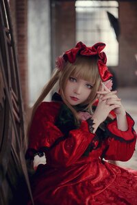 Rating: Safe Score: 0 Tags: 1girl bangs blonde_hair blue_eyes blurry bonnet curtains depth_of_field dress flower hands_together lips long_hair long_sleeves looking_at_viewer own_hands_together realistic red_dress rose shinku solo User: admin