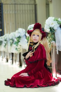 Rating: Safe Score: 0 Tags: 1girl blonde_hair blue_eyes blurry blurry_background bonnet depth_of_field dress flower lips long_hair long_sleeves photo red_dress rose shinku sitting solo User: admin