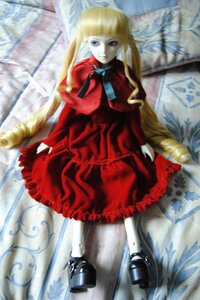 Rating: Safe Score: 0 Tags: 1girl bangs blonde_hair blue_eyes blurry blurry_foreground bow bowtie depth_of_field doll dress frills long_hair long_sleeves looking_at_viewer pantyhose photo red_dress shinku shoes solo standing very_long_hair User: admin