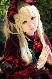 Rating: Safe Score: 0 Tags: 1girl bangs blonde_hair blue_eyes blurry bow capelet closed_mouth dress eyelashes flower lips lolita_fashion long_hair long_sleeves looking_at_viewer own_hands_together realistic red_capelet red_dress red_rose rose shinku solo upper_body User: admin
