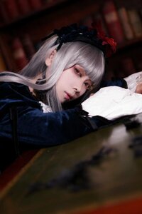 Rating: Safe Score: 0 Tags: 1girl bangs blurry blurry_background closed_mouth depth_of_field dress frills lips long_hair long_sleeves silver_hair solo suigintou User: admin