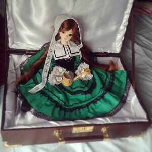 Rating: Safe Score: 0 Tags: 1girl bangs blurry blurry_background blurry_foreground brown_eyes brown_hair cup depth_of_field doll dress frills green_dress long_hair long_sleeves looking_at_viewer sitting solo suiseiseki very_long_hair User: admin