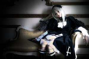 Rating: Safe Score: 0 Tags: 1girl breasts cleavage dress gothic_lolita lips lolita_fashion long_sleeves silver_hair sitting solo suigintou User: admin