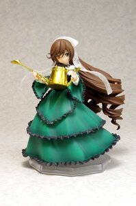 Rating: Safe Score: 0 Tags: 1girl brown_hair doll dress drill_hair flower frills full_body green_dress green_eyes head_scarf heterochromia instrument long_hair long_sleeves solo suiseiseki very_long_hair watering_can wide_sleeves User: admin