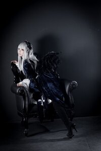 Rating: Safe Score: 0 Tags: 1girl black_footwear black_theme boots chair dress full_body gothic gothic_lolita high_heel_boots high_heels lolita_fashion long_hair looking_at_viewer sitting solo suigintou white_hair User: admin