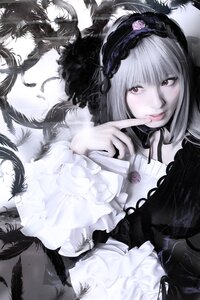 Rating: Safe Score: 0 Tags: 1girl dress feathers flower frills gothic_lolita hairband lolita_fashion long_hair long_sleeves looking_at_viewer rose smile solo suigintou User: admin