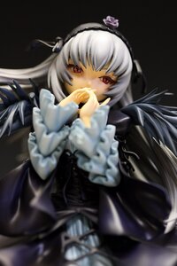 Rating: Safe Score: 0 Tags: 1girl bangs black_wings blurry blurry_foreground depth_of_field doll dress flower frilled_sleeves frills hairband long_hair long_sleeves looking_at_viewer red_eyes rose silver_hair solo suigintou wings User: admin