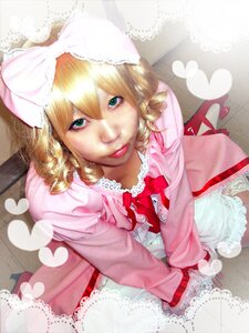 Rating: Safe Score: 0 Tags: 1girl blonde_hair bow dress drill_hair frills heart hinaichigo lips lipstick looking_at_viewer makeup photo realistic ribbon smile solo User: admin