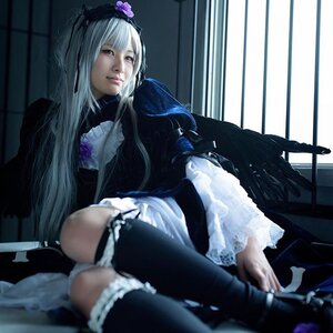 Rating: Safe Score: 0 Tags: 1girl blurry depth_of_field dress frills gothic_lolita lips lolita_fashion long_hair long_sleeves silver_hair sitting solo suigintou User: admin