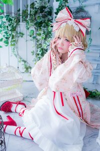 Rating: Safe Score: 0 Tags: 1girl blonde_hair blue_eyes bow dress hair_ribbon hinaichigo lace lips looking_at_viewer nail_polish plant ribbon ribbon_trim shoes short_hair sitting solo white_dress User: admin