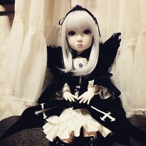 Rating: Safe Score: 0 Tags: 1girl bangs black_dress closed_mouth curtains doll dress expressionless frills gothic_lolita lace long_hair long_sleeves looking_at_viewer sitting solo suigintou User: admin