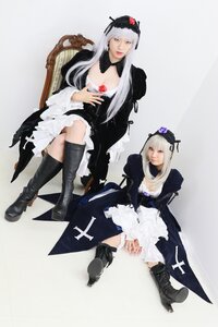 Rating: Safe Score: 0 Tags: 2girls blue_eyes boots dress dual_persona hat long_hair multiple_girls silver_hair sitting solo suigintou User: admin