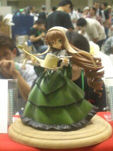 Rating: Safe Score: 0 Tags: 1girl blonde_hair blurry blurry_background blurry_foreground cup depth_of_field doll dress drill_hair frills green_dress long_hair long_sleeves motion_blur photo solo suiseiseki very_long_hair wide_sleeves User: admin