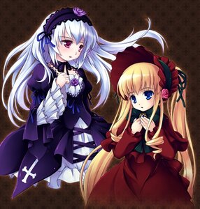 Rating: Safe Score: 0 Tags: 2girls blonde_hair blue_eyes blush bonnet bow dress flower frills hairband hands_on_own_chest image long_hair long_sleeves multiple_girls pair red_eyes rose shinku suigintou twintails very_long_hair User: admin