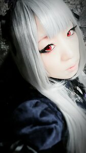 Rating: Safe Score: 0 Tags: 1girl bangs black_background closed_mouth eyelashes face lips long_hair looking_at_viewer red_eyes simple_background solo suigintou white_hair User: admin
