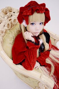 Rating: Safe Score: 0 Tags: 1girl bangs blonde_hair blue_eyes bonnet bow dress flower lace long_hair long_sleeves looking_at_viewer red_dress red_flower red_rose rose shinku sitting solo traditional_media User: admin