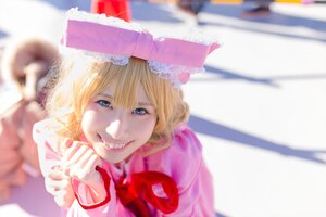 Rating: Safe Score: 0 Tags: 1girl blonde_hair blue_eyes blurry blurry_background blurry_foreground bow depth_of_field dress frills hat hinaichigo looking_at_viewer motion_blur ribbon smile solo teeth User: admin