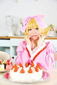 Rating: Safe Score: 0 Tags: 1girl bangs blonde_hair blurry bow cake depth_of_field food frills fruit green_eyes hina_ichigo hinaichigo indoors long_sleeves looking_at_viewer photo pink_dress solo strawberry table User: admin