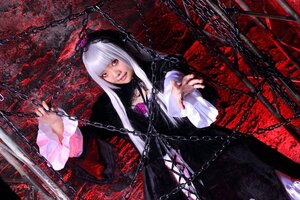 Rating: Safe Score: 0 Tags: 1girl black_dress chain chained dress gothic_lolita long_hair long_sleeves red_eyes solo white_hair User: admin