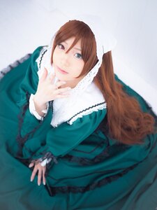 Rating: Safe Score: 0 Tags: 1girl blurry brown_hair closed_mouth depth_of_field dress frills green_dress green_eyes heterochromia lips long_hair long_sleeves looking_at_viewer red_eyes smile solo suiseiseki very_long_hair User: admin