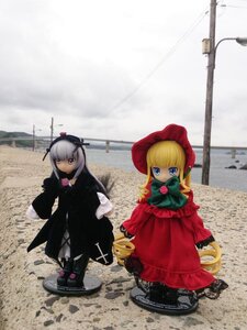 Rating: Safe Score: 0 Tags: 2girls blonde_hair blue_eyes bonnet bow doll dress drill_hair ground_vehicle gun lamppost long_hair long_sleeves looking_at_viewer motor_vehicle multiple_dolls multiple_girls red_dress shinku shoes standing suigintou tagme twintails User: admin