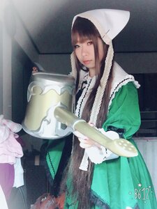 Rating: Safe Score: 0 Tags: 1girl bangs blunt_bangs brown_hair dress green_dress holding instrument lips long_hair looking_at_viewer photo solo standing suiseiseki User: admin