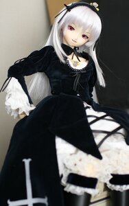 Rating: Safe Score: 0 Tags: 1girl black_dress blurry blurry_foreground depth_of_field doll dress frills hairband long_hair long_sleeves looking_at_viewer photo red_eyes silver_hair sitting smile solo suigintou User: admin