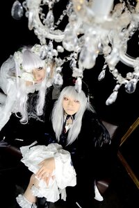 Rating: Safe Score: 0 Tags: 2girls black_background black_dress blurry blurry_foreground depth_of_field dress flower frills long_hair multiple_cosplay multiple_girls siblings sisters sitting tagme twins white_hair User: admin